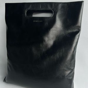 Helmut Lang black leather tote bag.